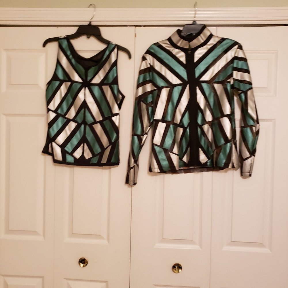 This is a sleeveless camisole and matching jacket